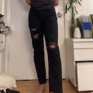 distressed black jeans